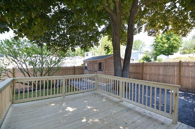 19 Woodcliff Rd, Holbrook, MA 02343 - deck with a fenced backyard and an outbuilding