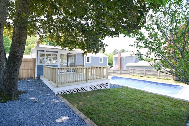 19 Woodcliff Rd, Holbrook, MA 02343 - back of property featuring a deck and a chimney