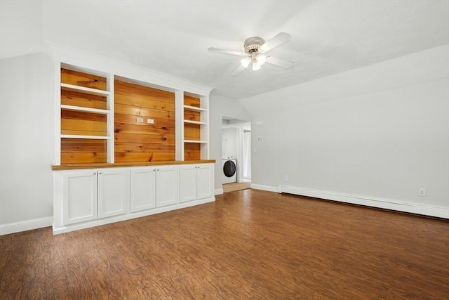 31 Granite St, Walpole, MA 02081 - unfurnished living room with washer / clothes dryer, a ceiling fan, wood finished floors, and vaulted ceiling