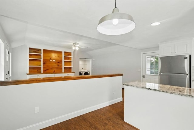 31 Granite St, Walpole, MA 02081 - kitchen with freestanding refrigerator, dark wood-type flooring, white cabinetry, a ceiling fan, and light stone counters