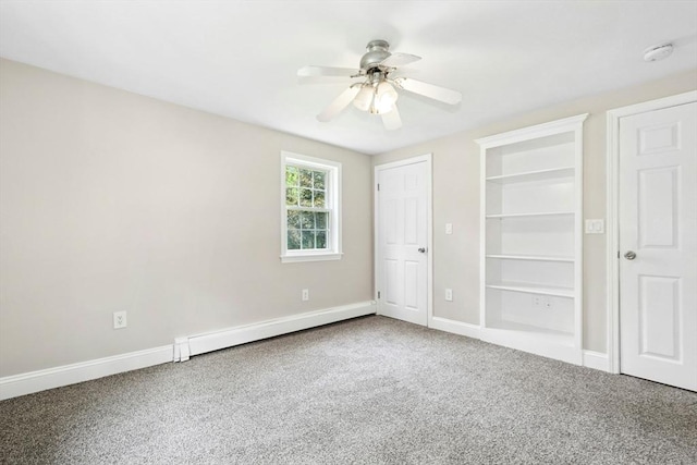31 Granite St, Walpole, MA 02081 - unfurnished bedroom featuring carpet flooring, baseboard heating, and ceiling fan