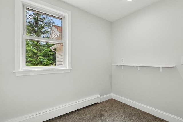 31 Granite St, Walpole, MA 02081 - unfurnished room featuring baseboard heating and dark colored carpet