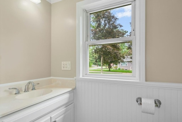 31 Granite St, Walpole, MA 02081 - bathroom featuring healthy amount of natural light, a wainscoted wall, and vanity