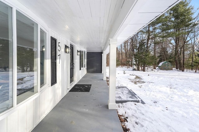 view of snow covered patio