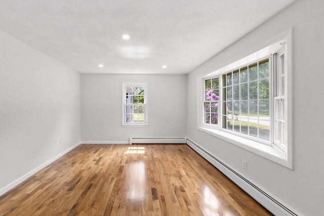 6 Walter St, Norton, MA 02766 - spare room featuring baseboard heating, wood finished floors, recessed lighting, and baseboards