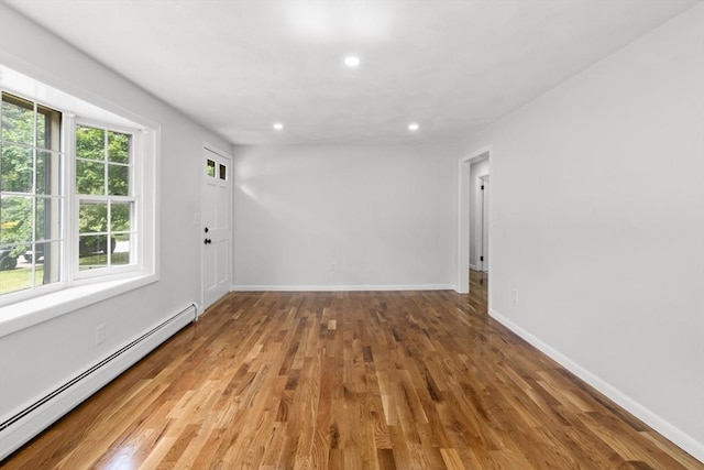 6 Walter St, Norton, MA 02766 - empty room with a baseboard heating unit, baseboards, recessed lighting, and wood finished floors