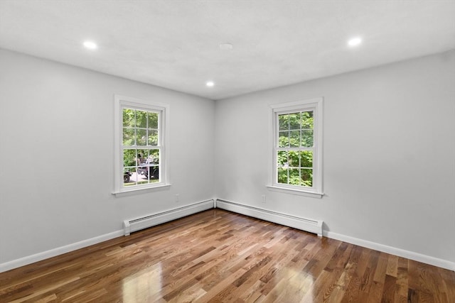 6 Walter St, Norton, MA 02766 - spare room featuring wood finished floors, recessed lighting, baseboards, and a baseboard radiator
