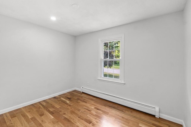6 Walter St, Norton, MA 02766 - spare room featuring a baseboard radiator, light wood-style floors, baseboards, and recessed lighting