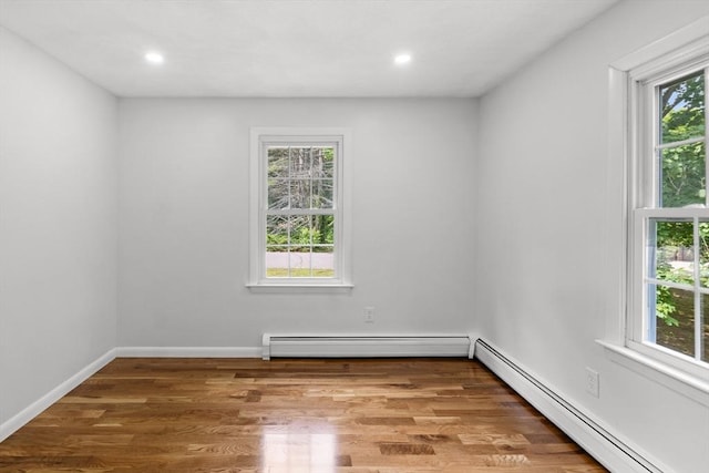 6 Walter St, Norton, MA 02766 - spare room featuring baseboard heating, recessed lighting, wood finished floors, and baseboards