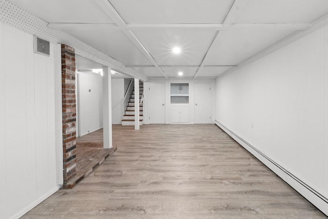 6 Walter St, Norton, MA 02766 - finished basement with a baseboard radiator, wood finished floors, recessed lighting, and stairway
