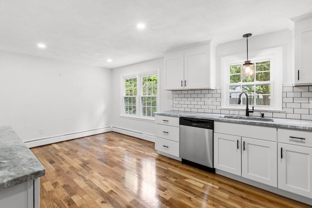 6 Walter St, Norton, MA 02766 - kitchen with stainless steel dishwasher, a sink, backsplash, white cabinets, and recessed lighting