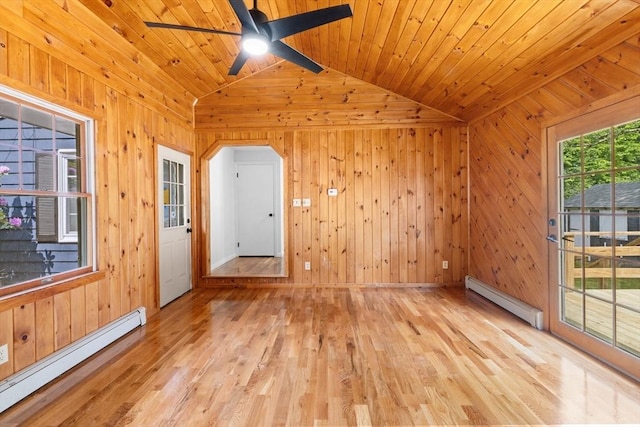 6 Walter St, Norton, MA 02766 - unfurnished room with baseboard heating, vaulted ceiling, wooden walls, light wood-style floors, and a ceiling fan