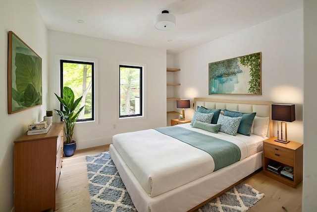 230 Auburn St Unit 230, Newton, MA 02466 - bedroom featuring light wood finished floors and baseboards