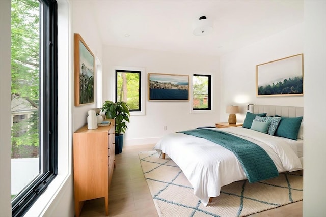 230 Auburn St Unit 230, Newton, MA 02466 - bedroom with baseboards and wood finished floors