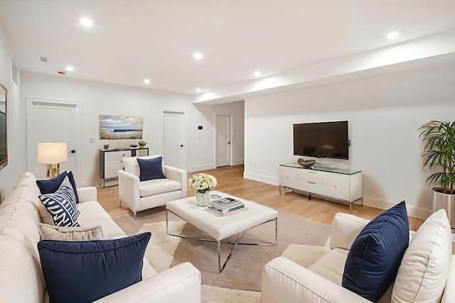 230 Auburn St Unit 230, Newton, MA 02466 - living area featuring light wood-style floors, recessed lighting, and baseboards