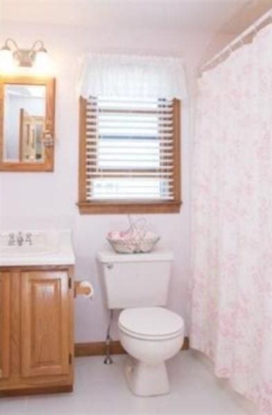 6 Tisdale Dr Unit 6, Dover, MA 02030 - bathroom featuring vanity and a shower with shower curtain