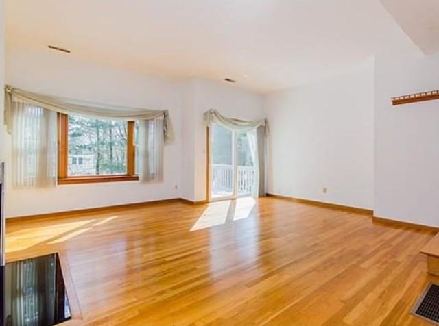6 Tisdale Dr Unit 6, Dover, MA 02030 - unfurnished room with wood finished floors and baseboards