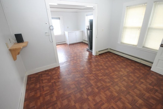 57 Edgewater Rd-, Waterfront, Hull, MA 02045 - spare room featuring baseboards, a baseboard radiator, and a baseboard heating unit