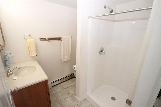 57 Edgewater Rd-, Waterfront, Hull, MA 02045 - full bathroom with a baseboard heating unit, a stall shower, vanity, and tile patterned floors
