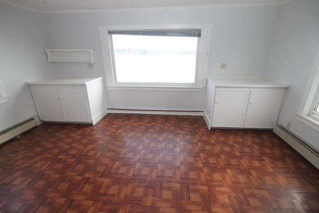 57 Edgewater Rd-, Waterfront, Hull, MA 02045 - unfurnished dining area featuring a baseboard heating unit, plenty of natural light, and ornamental molding