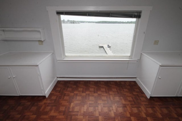 57 Edgewater Rd-, Waterfront, Hull, MA 02045 - unfurnished dining area with baseboards