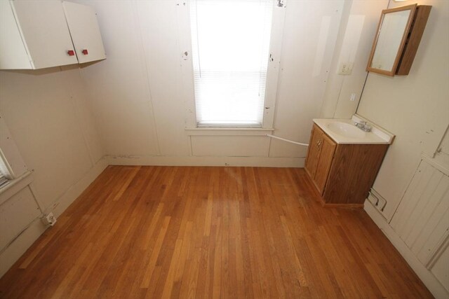 57 Edgewater Rd-, Waterfront, Hull, MA 02045 - unfurnished room featuring light wood-type flooring and a sink