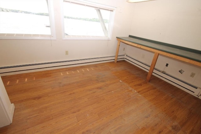 57 Edgewater Rd-, Waterfront, Hull, MA 02045 - empty room featuring light wood-style floors and a baseboard radiator