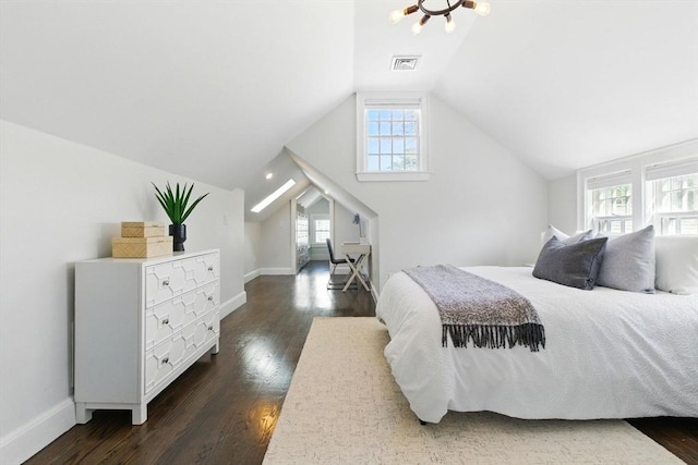 bedroom featuring visible vents, baseboards, dark wood-style flooring, and lofted ceiling