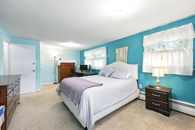 2500 Pendleton Ave Unit 2500, Chicopee, MA 01022 - bedroom with carpet, a baseboard radiator, and a textured ceiling