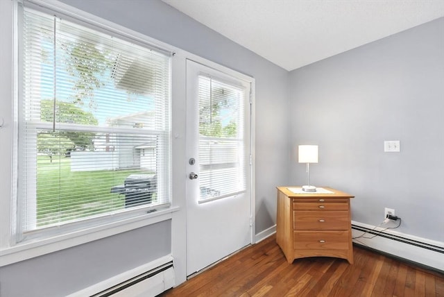 2500 Pendleton Ave Unit 2500, Chicopee, MA 01022 - doorway with dark wood finished floors and baseboard heating