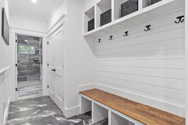 306 Laws Brook Rd, Concord, MA 01742 - mudroom featuring crown molding and dark marble finish flooring