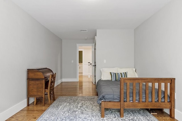 306 Laws Brook Rd, Concord, MA 01742 - bedroom with wood finished floors and baseboards
