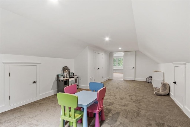 306 Laws Brook Rd, Concord, MA 01742 - rec room featuring carpet floors, vaulted ceiling, and baseboards