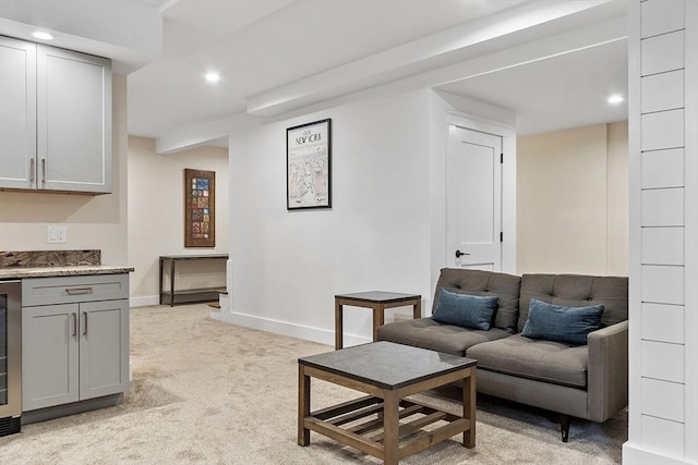 306 Laws Brook Rd, Concord, MA 01742 - living area featuring light colored carpet, baseboards, recessed lighting, beverage cooler, and bar