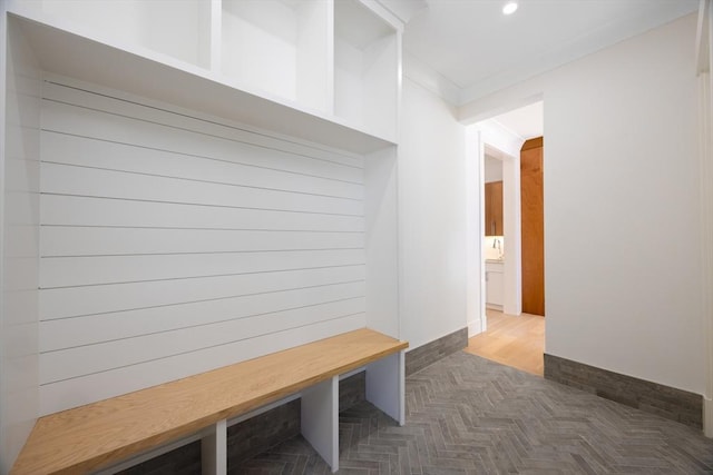 mudroom with crown molding