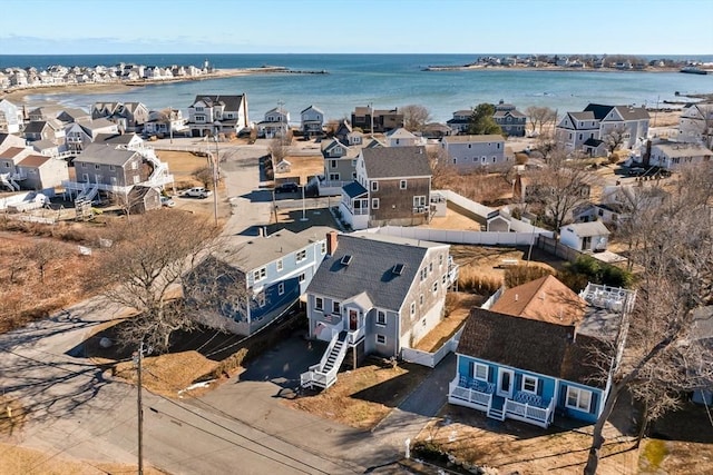 aerial view with a residential view and a water view