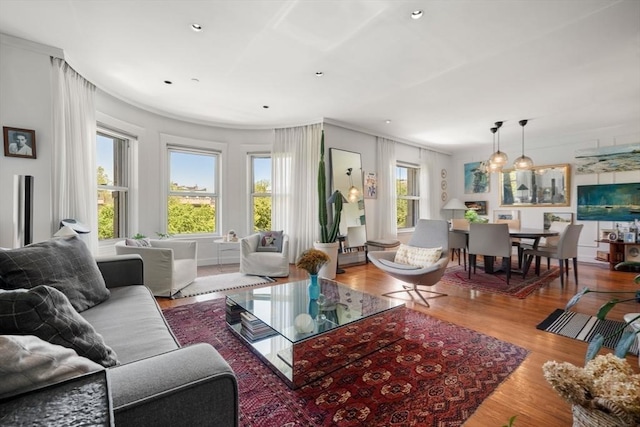 416 Commonwealth Ave Unit 504, Boston, MA 02215 - living room featuring wood finished floors, recessed lighting, and a chandelier
