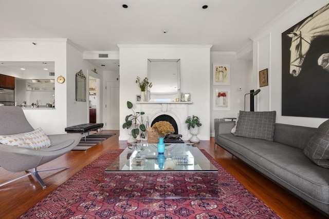416 Commonwealth Ave Unit 504, Boston, MA 02215 - living room with wood finished floors, ornamental molding, and a fireplace
