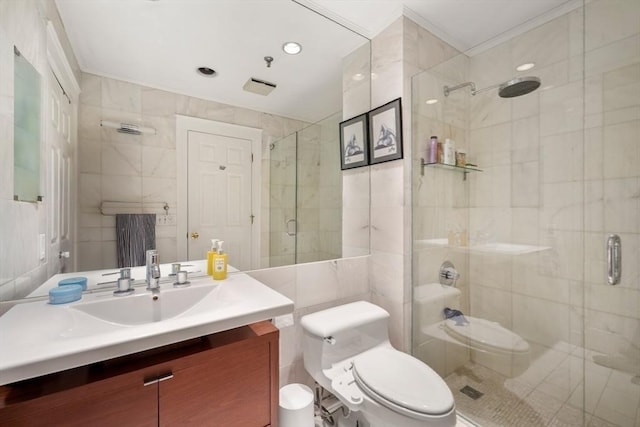 416 Commonwealth Ave Unit 504, Boston, MA 02215 - full bathroom with tile walls, toilet, a stall shower, vanity, and ornamental molding