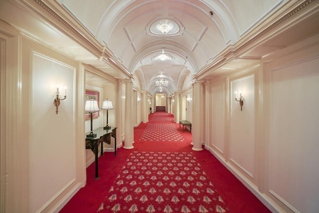 416 Commonwealth Ave Unit 504, Boston, MA 02215 - hall featuring ornate columns, vaulted ceiling, and dark colored carpet