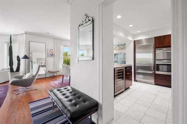 416 Commonwealth Ave Unit 504, Boston, MA 02215 - kitchen featuring stainless steel appliances, wine cooler, light countertops, and recessed lighting