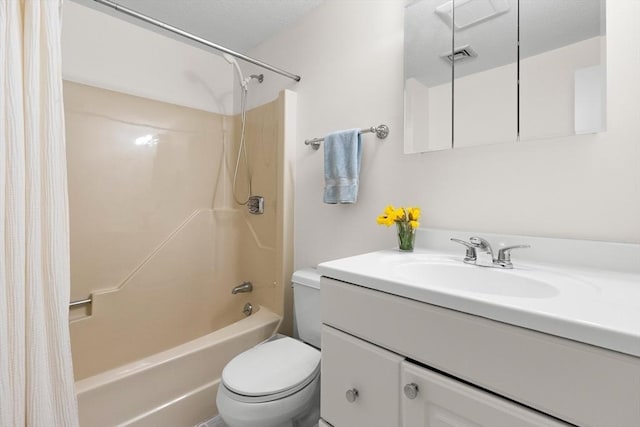 full bath with toilet, shower / bath combo with shower curtain, and vanity