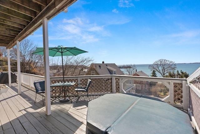 deck featuring a water view
