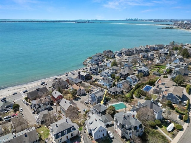 aerial view with a residential view and a water view