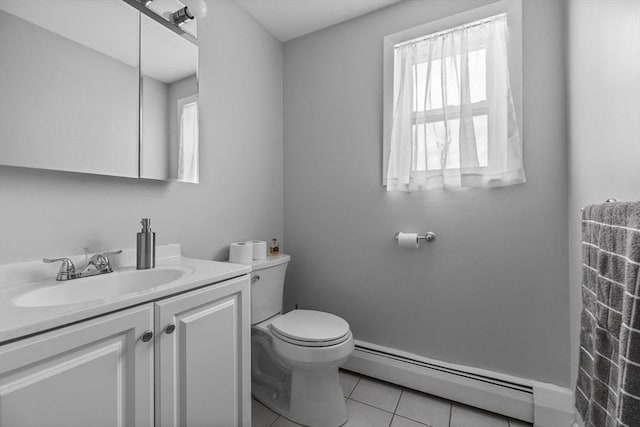bathroom with vanity, tile patterned floors, a baseboard heating unit, and toilet