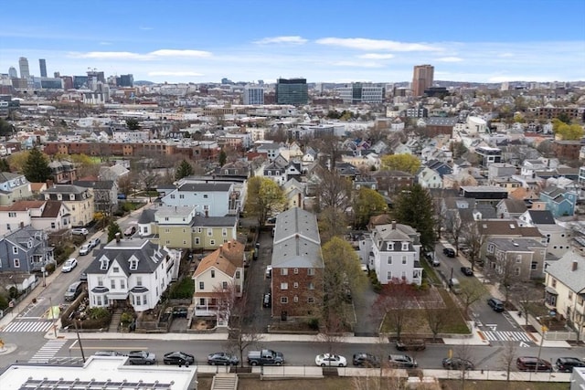 birds eye view of property with a view of city