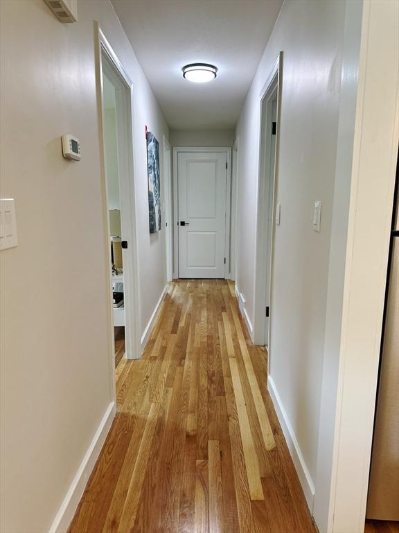 17 Kingsley Rd, Norton, MA 02766 - hallway featuring light wood-style flooring and baseboards