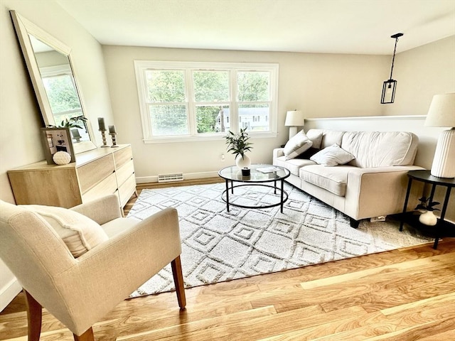 17 Kingsley Rd, Norton, MA 02766 - living room with light wood-style flooring and baseboards