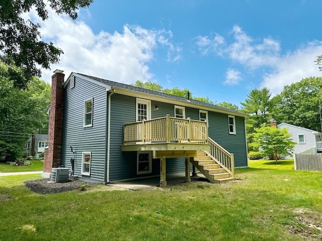 17 Kingsley Rd, Norton, MA 02766 - back of house featuring stairs, a wooden deck, a lawn, and a chimney