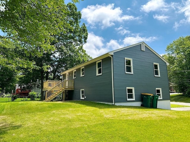 17 Kingsley Rd, Norton, MA 02766 - back of property with a yard, a deck, and stairs